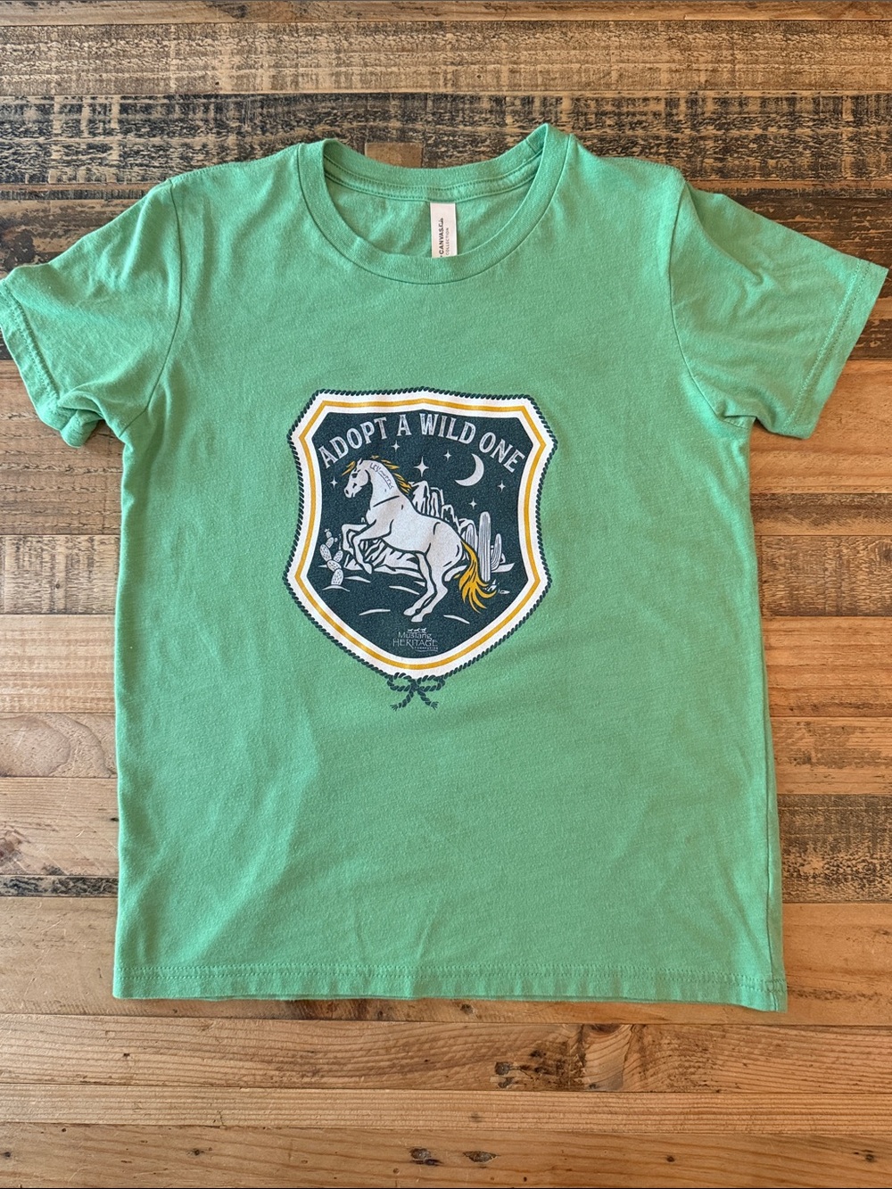 Youth M (10-12) Adopt A Wild One" Green Graphic Tee
